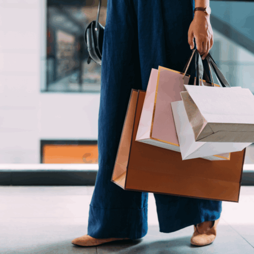 Woman holding selection of shopping bags